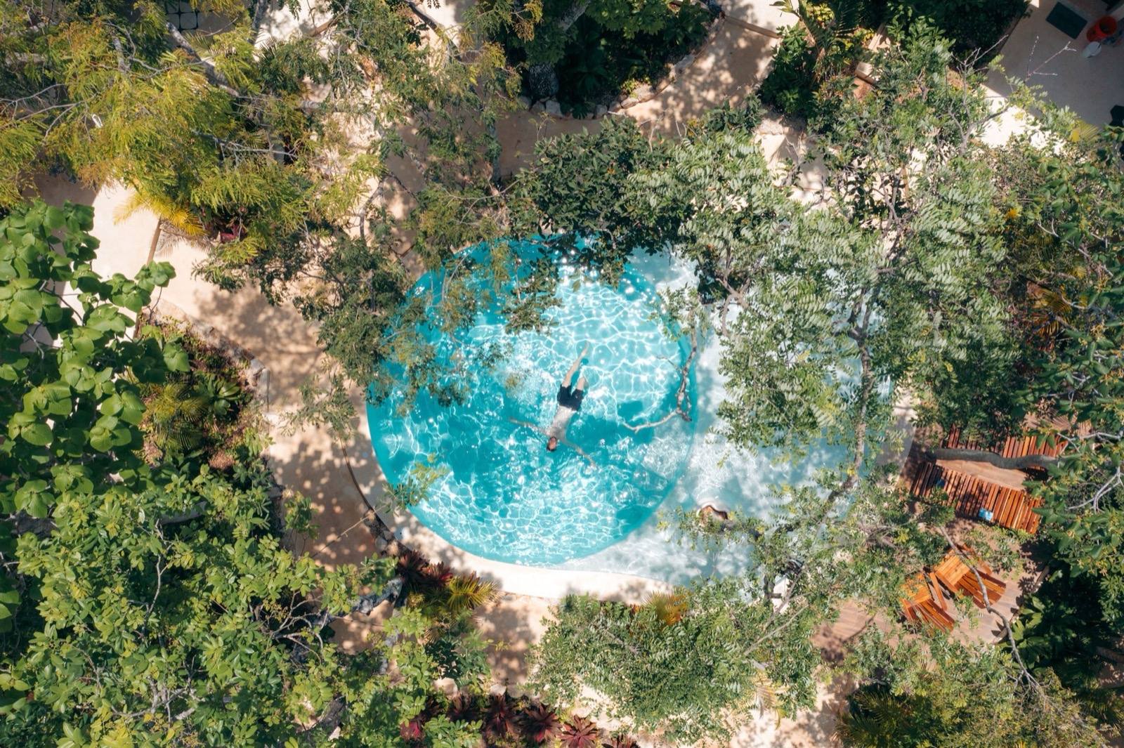 Aerial drone photography of hotel pool and resort grounds