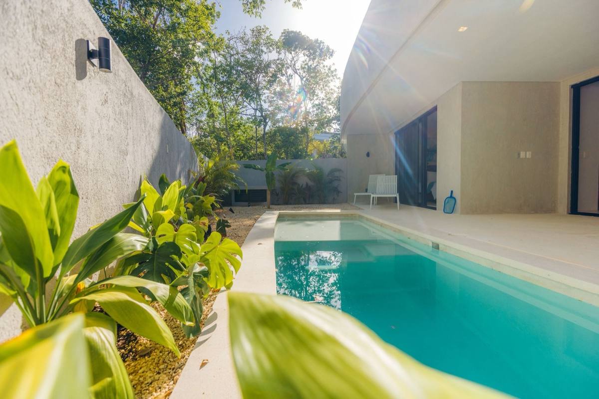 Boutique hotel pool photography at Treetops Tulum