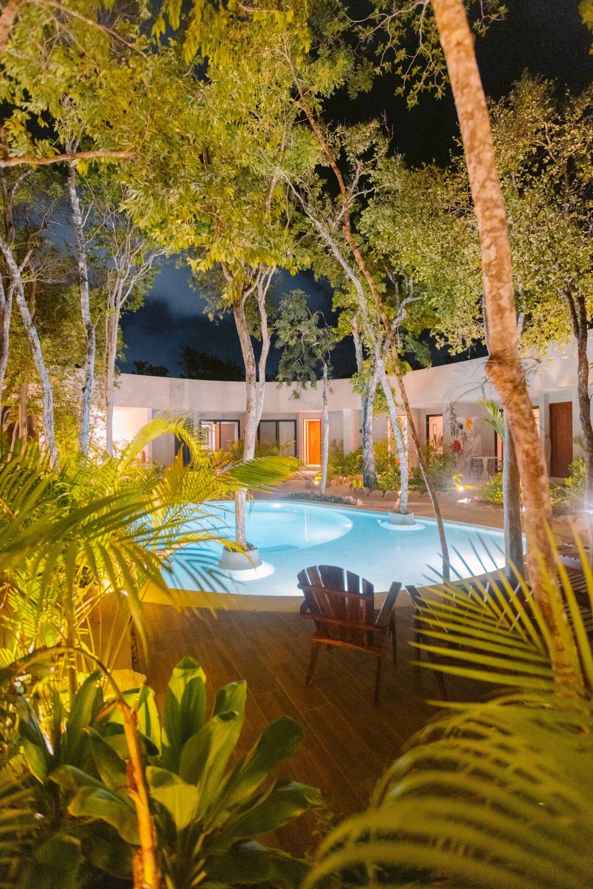 Night photography of boutique hotel pool in Tulum Mexico
