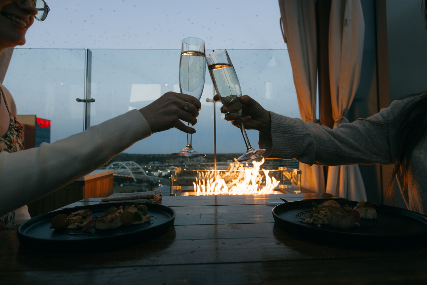 Rooftop dining and toast photography